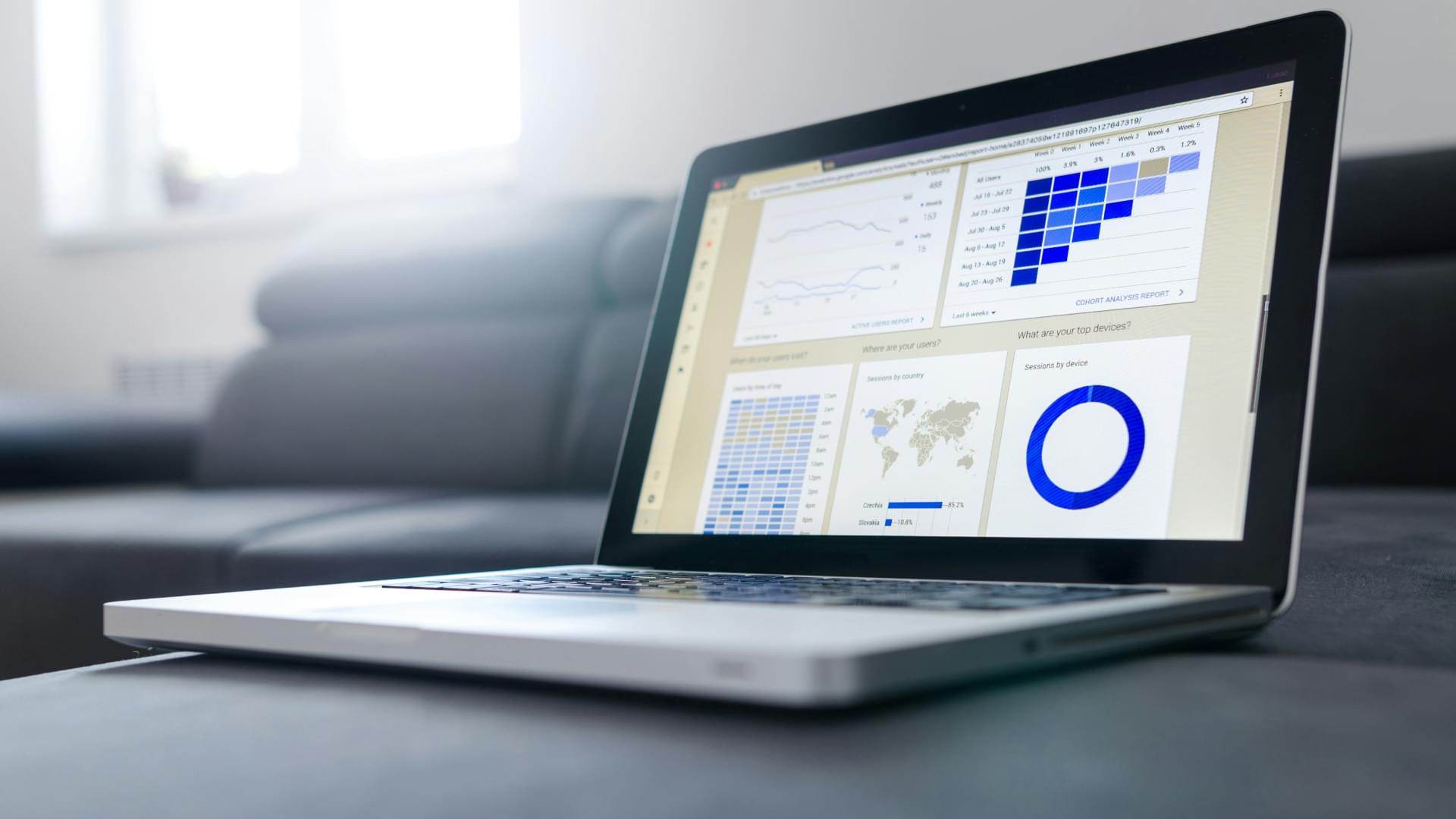 open laptop showing graphs