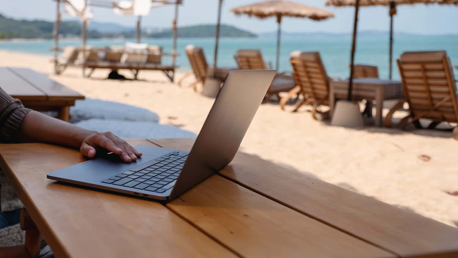 Laptop on tropical beach