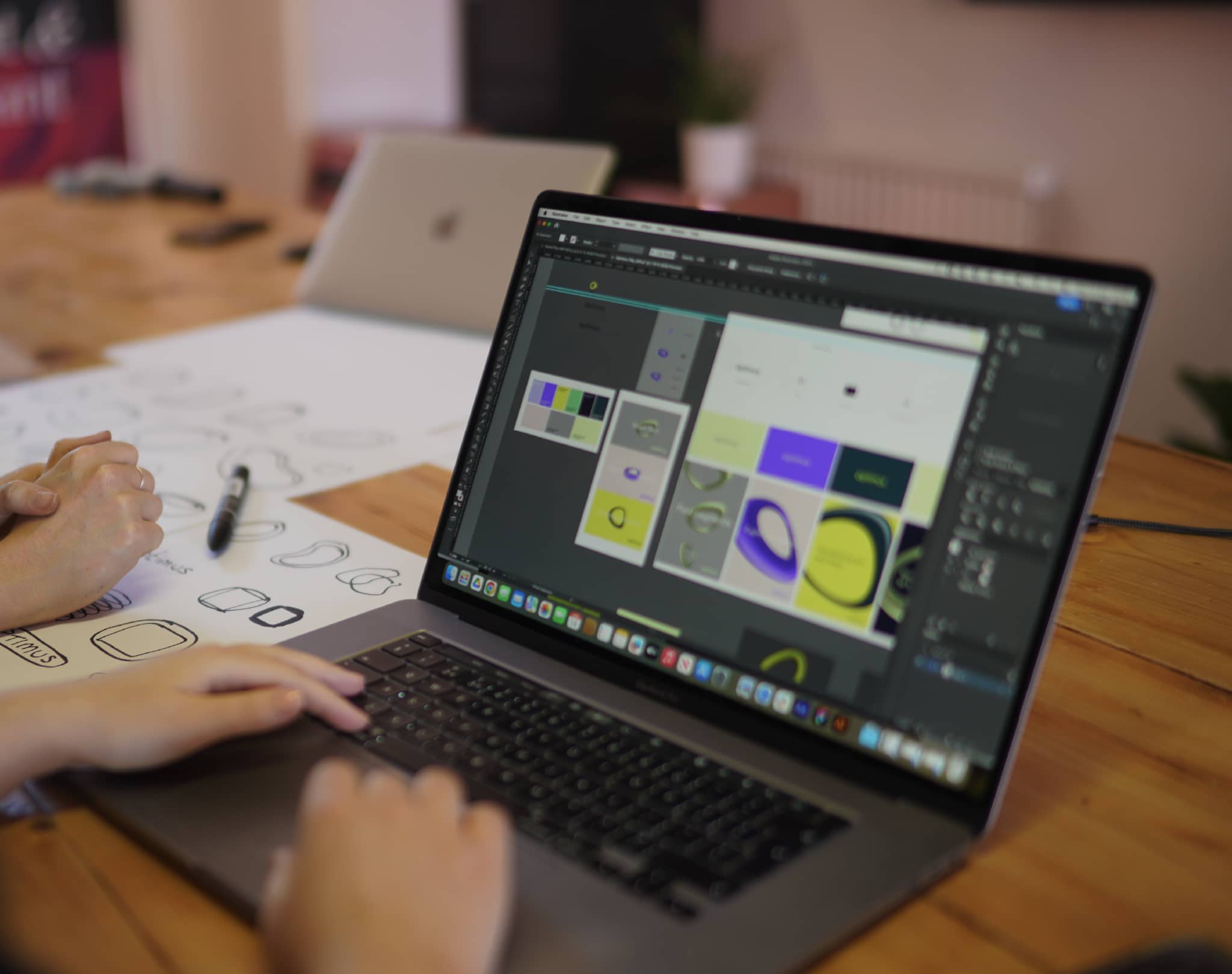 Brand visual elements on laptop screen
