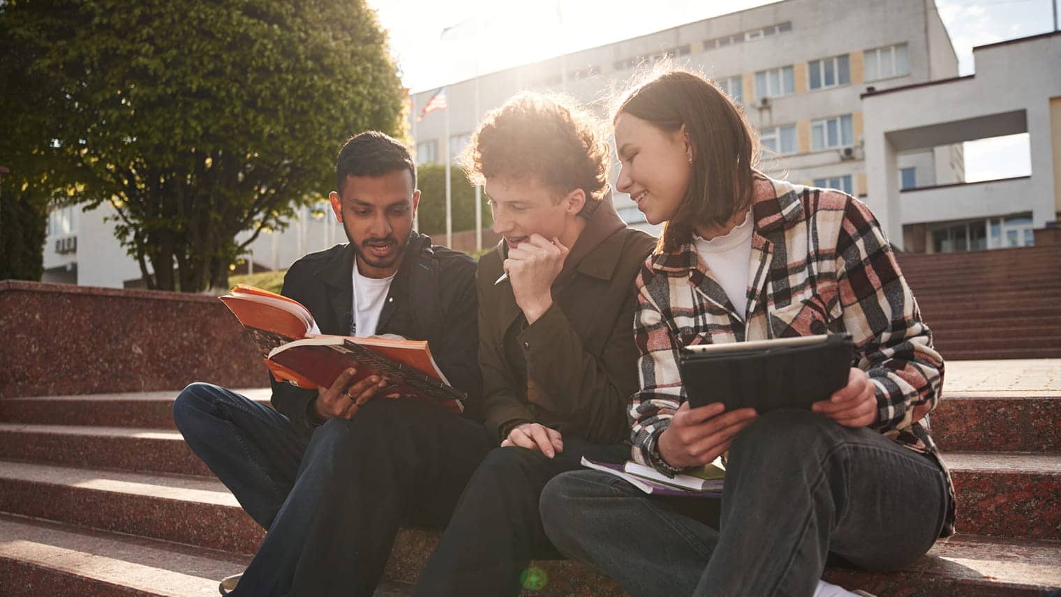 Students sat on steps