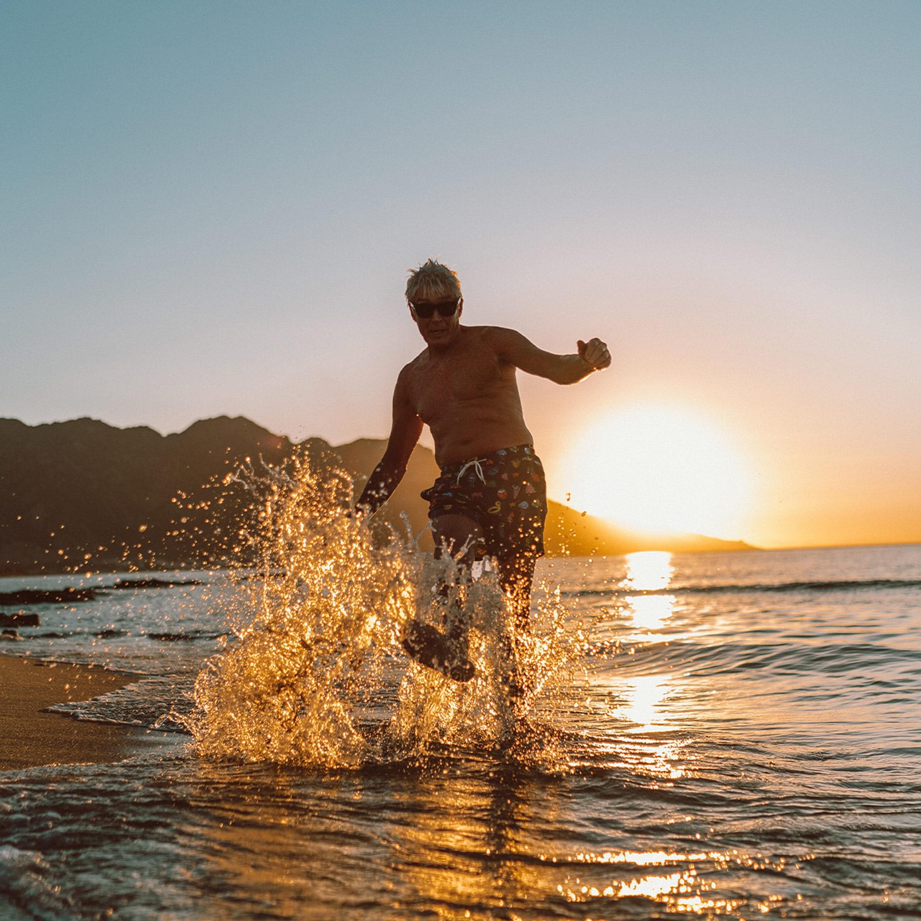 splashing on the beach