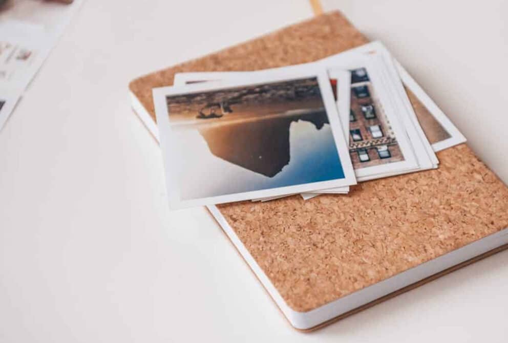 polaroid images spread out on table