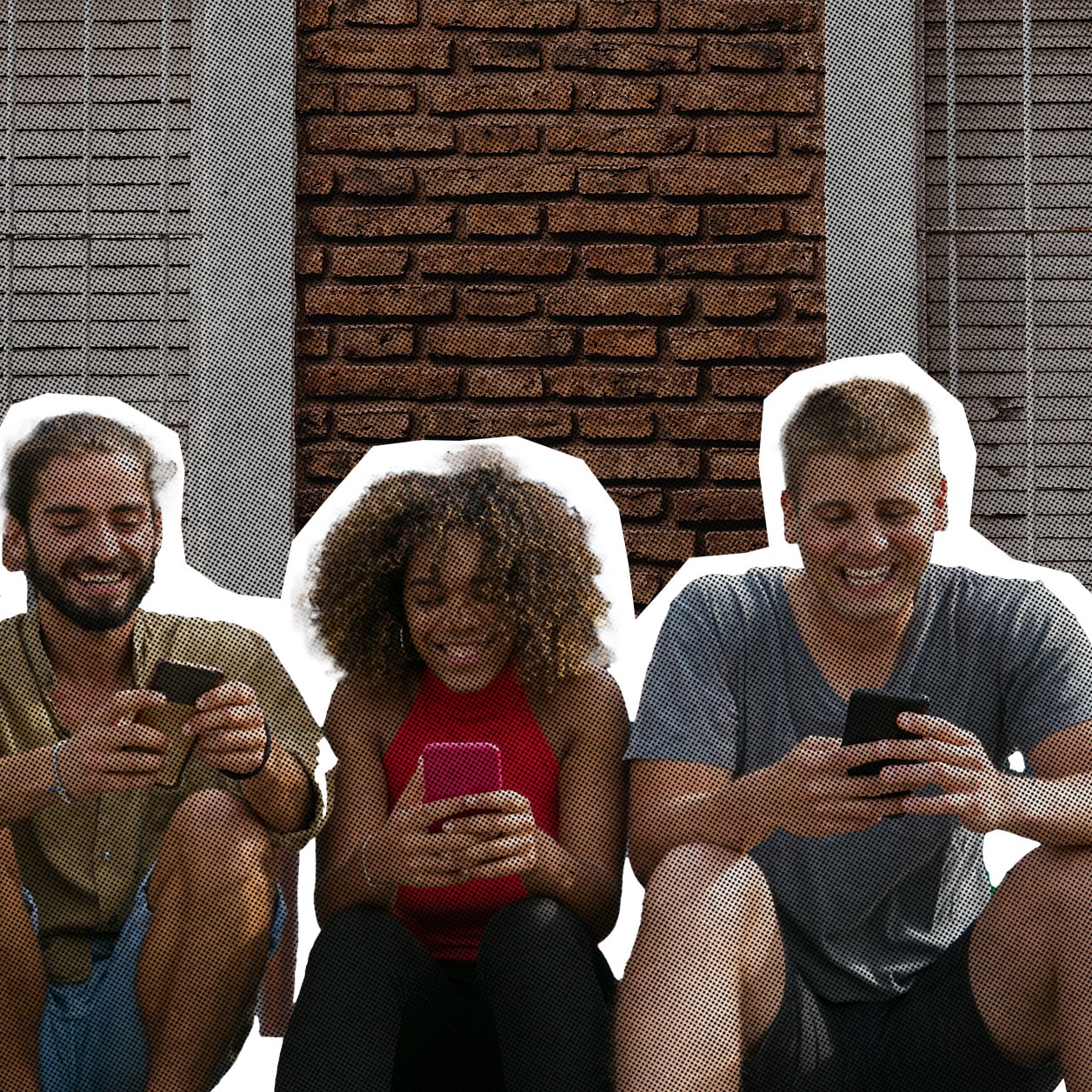 Group of people sat down looking on phones