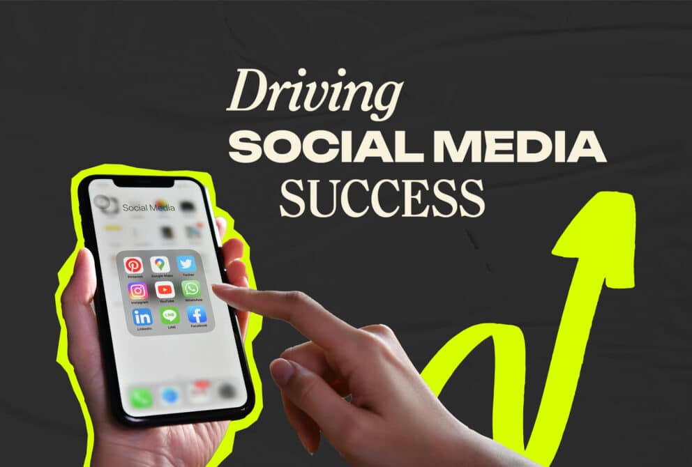 Hands holding mobile phone with social media icons