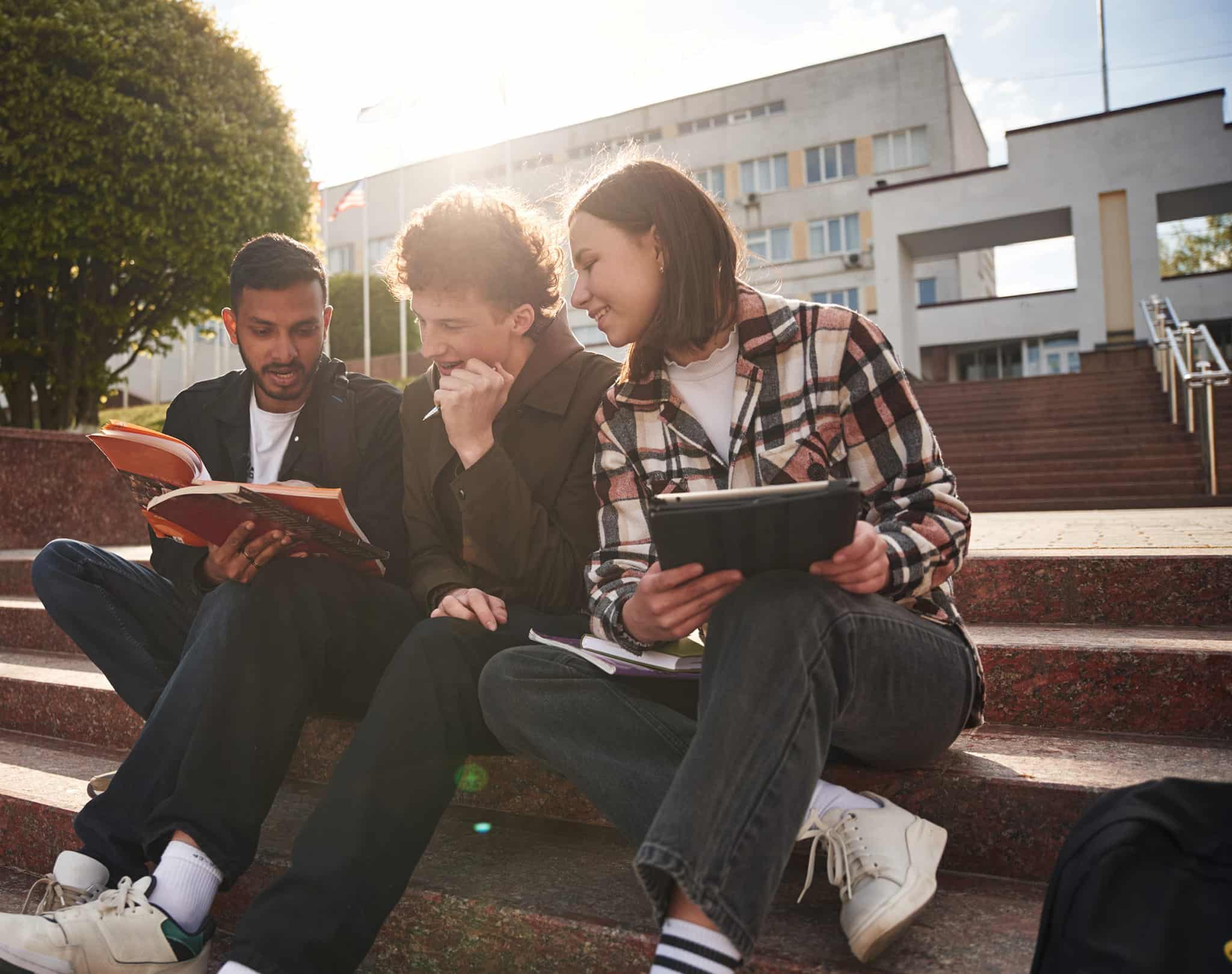 Students sat on steps