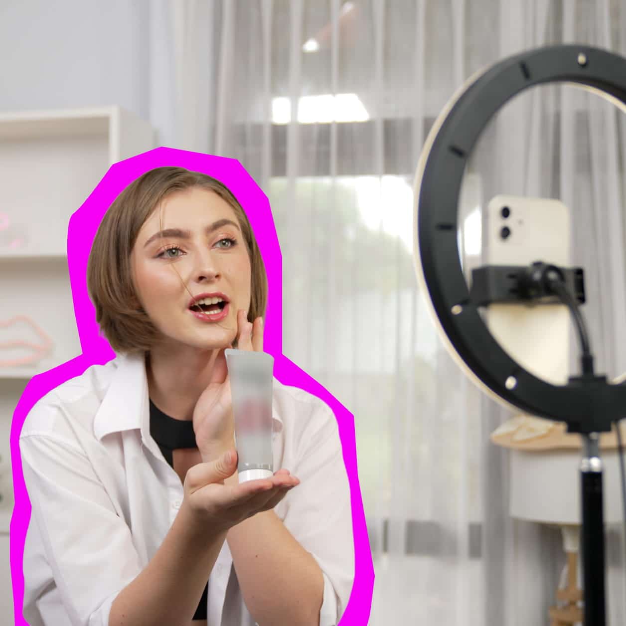 Woman influencer filming with product